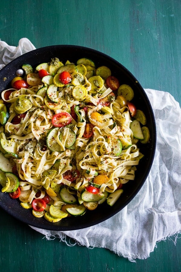 This summer vegetable pesto pasta is the perfect addition to your summer menu. Packed full of fresh garden vegetables, basil pesto and just a pinch of Parmesan cheese.
